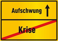 Schild zeigt Ende der Krise und den nahenden Aufschwung.